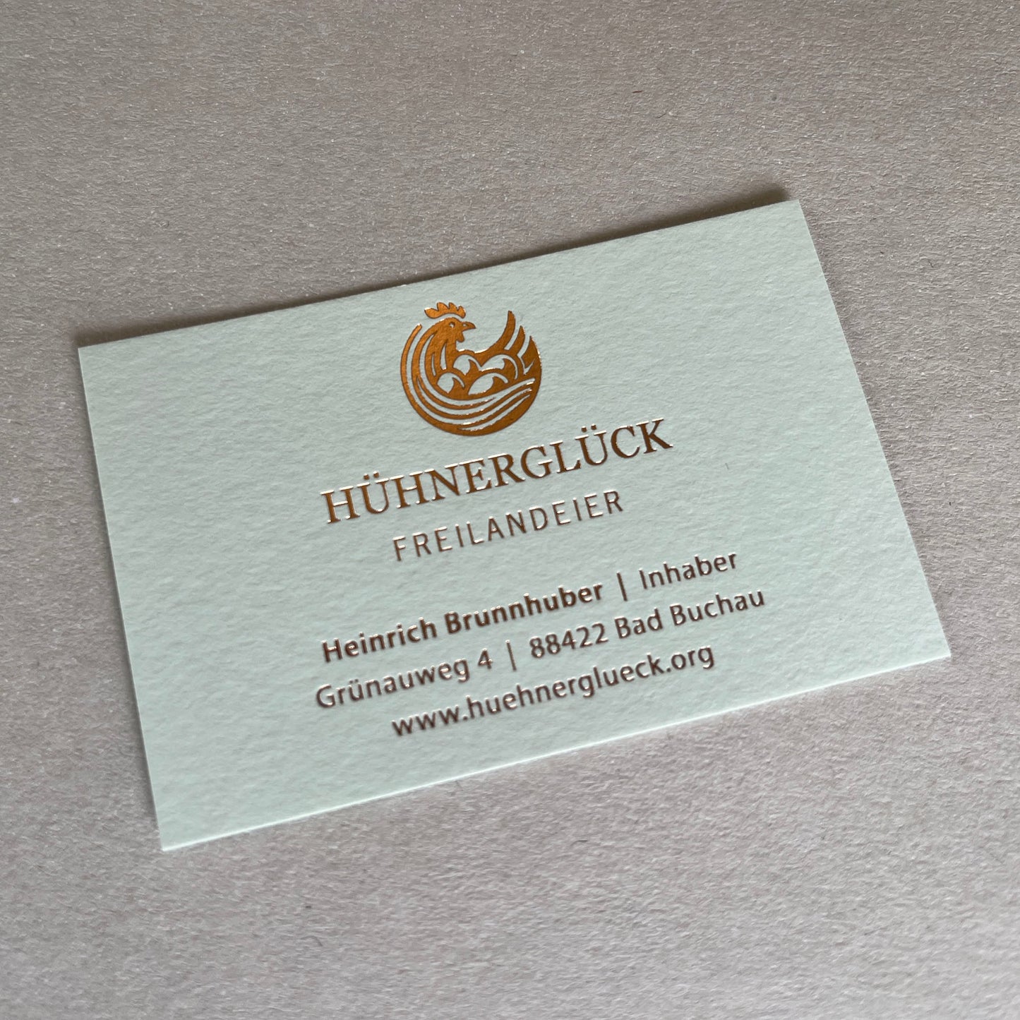 Visitenkarte Colorplan mit kupferfarbener Flachprägung