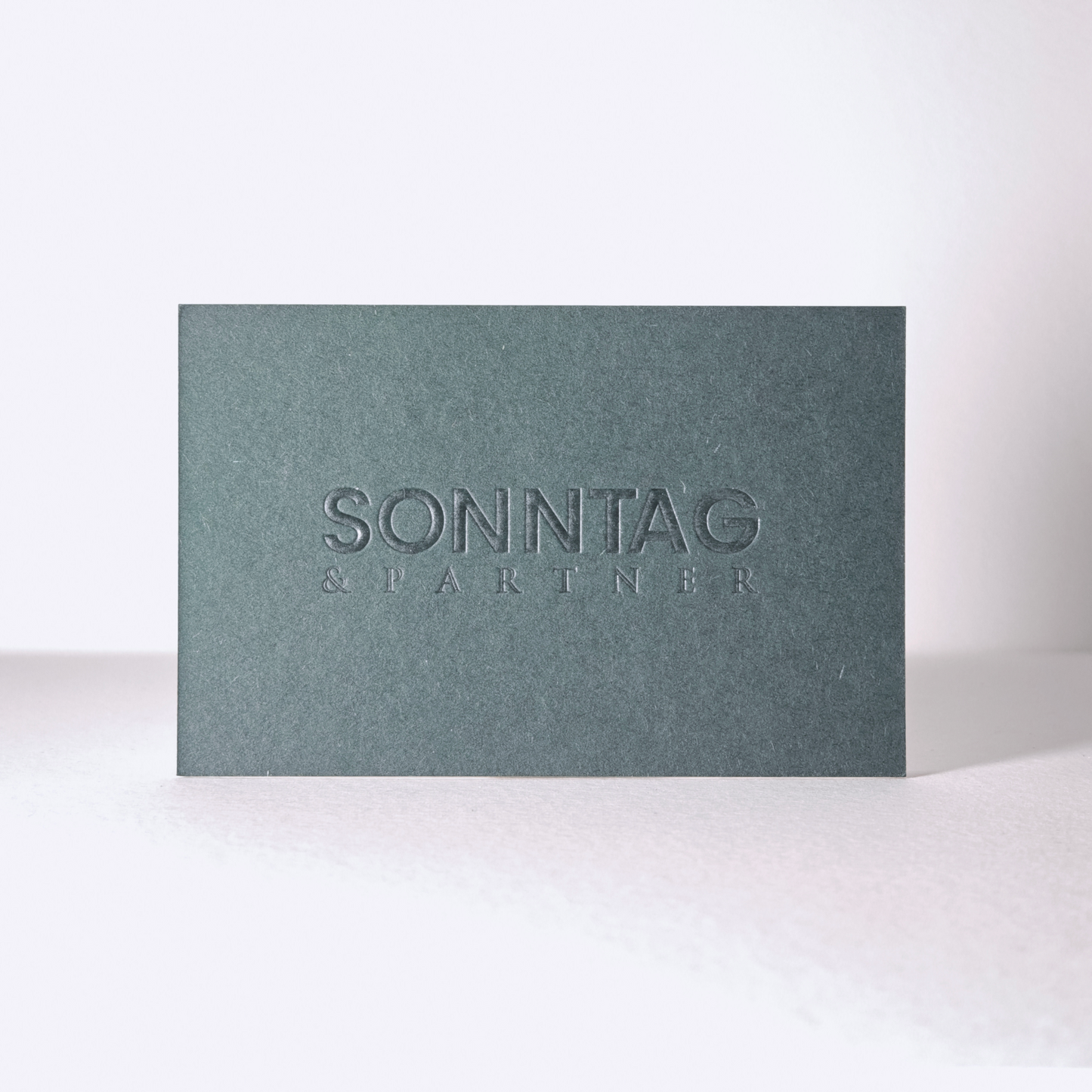 Colorplan Visitenkarten mit Reliefprägung: Beispiel SONNTAG UND PARTNER