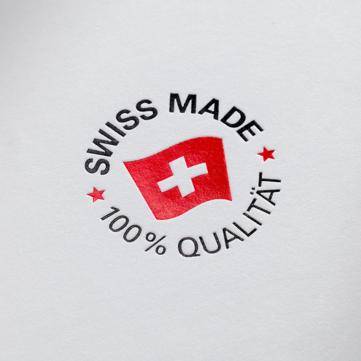 Visitenkarte mit Heißfolienprägung: Beispiel SWISS MADE